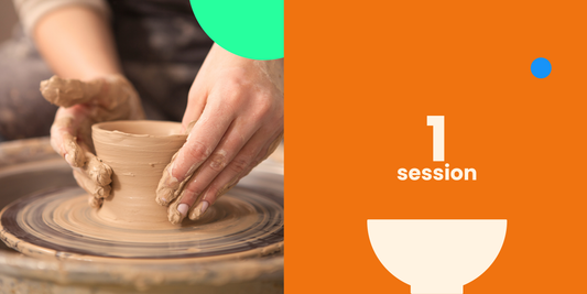 a pair of hands on wheel throwing caly to a cup